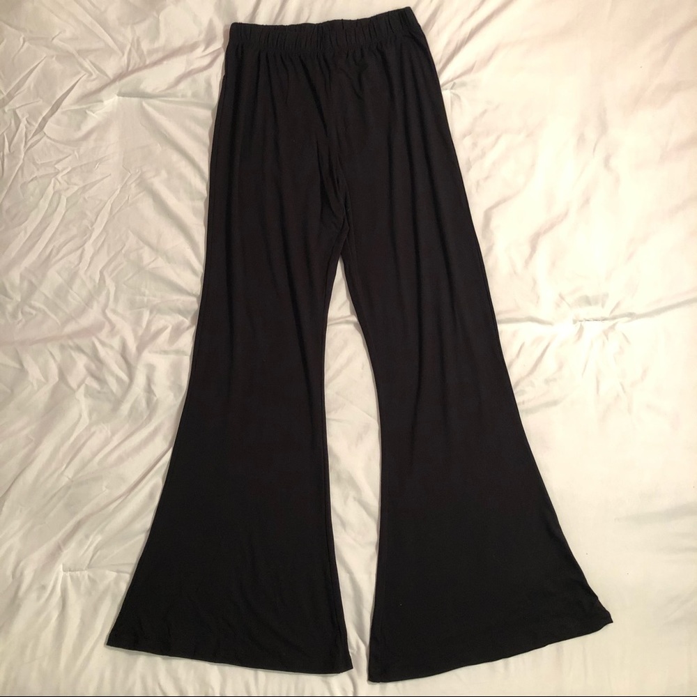 Black bell bottom pants jersey knit pants.